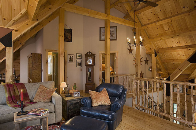 Interior, horizontal, loft sitting area towards grandfather clock, Hofmann residence, Pike, New Hampshire, Coventry Log Homes