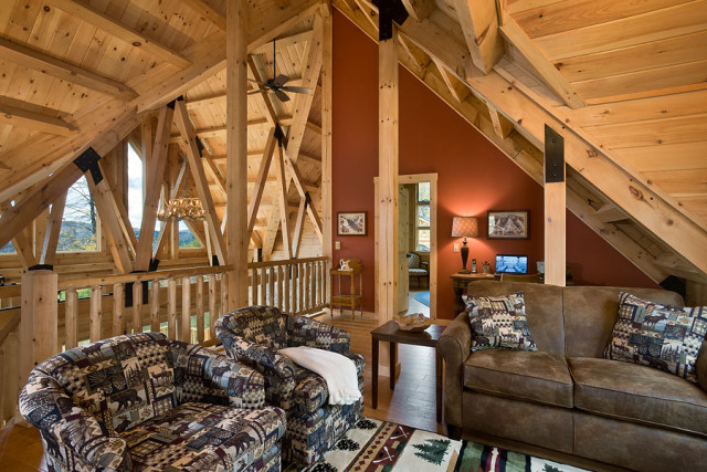 Interior, horizontal, loft looking into living room, Rosenfeld residence, Franconia, New Hampshire; Coventry Log Homes