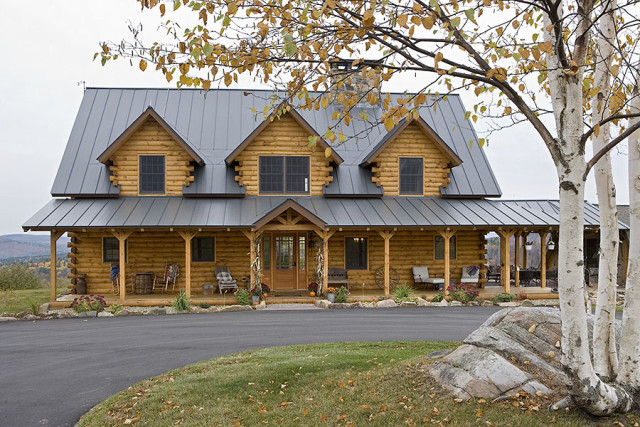 Exterior, horizontal, front elevation through birch trees, Hofmann residence, Pike, New Hampshire, Coventry Log Homes
