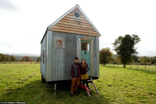 Couple-build-tiny-cabin-from-SCRAP-1
