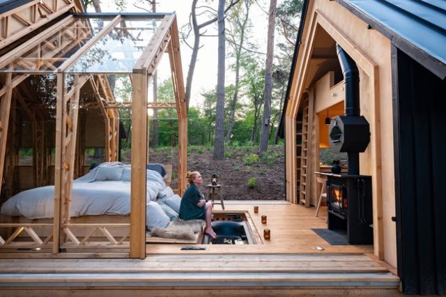 This $480K Prefab Luxury Cabin Slides Apart to Reveal a Glass Enclosed Room